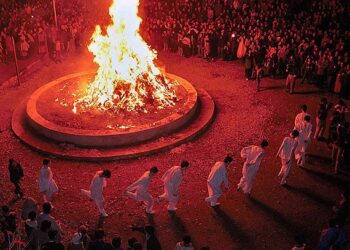 Iranian Zoroastrian dancing round a fire during celebration of 
"Sade-h" in Tehran. This is a traditional celebration for Zoroastrians every year in Jan30 becuse in this day Fire was discovered by Iranian 
people tens of thousands years ago.Sunday Jan 30,2000 
(AP Photo/Hasan Sarbakhshian)